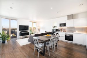 Stunning apartment in Queens Park Place featuring a large terrace, underground parking and 24 hour concierge.