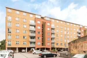 A beautifully presented three-bedroom, two-bathroom apartment offering generous living space and a private garden.